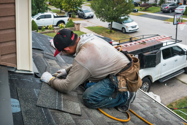 Professional Roofing technician working in Libertyville, IA